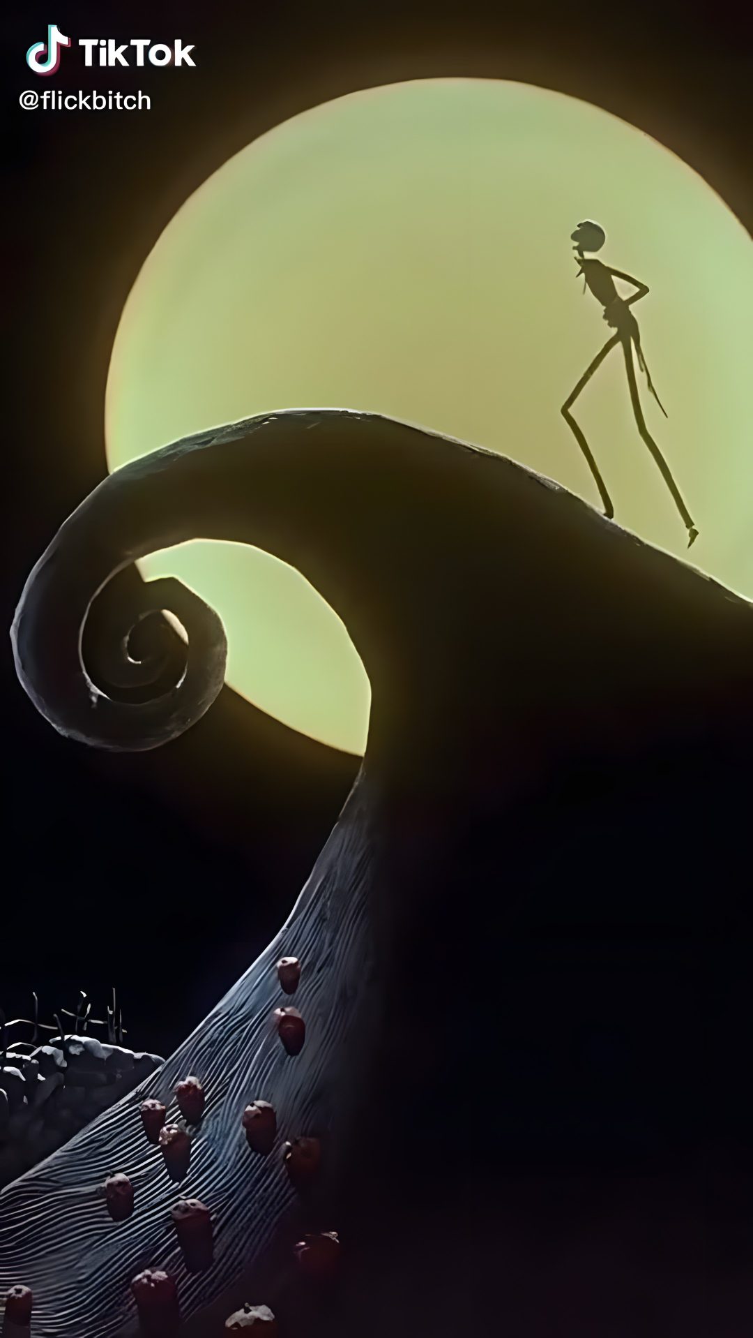 the animated character is standing on top of a hill in front of a full moon Halloween Town Nightmare Before Christmas black