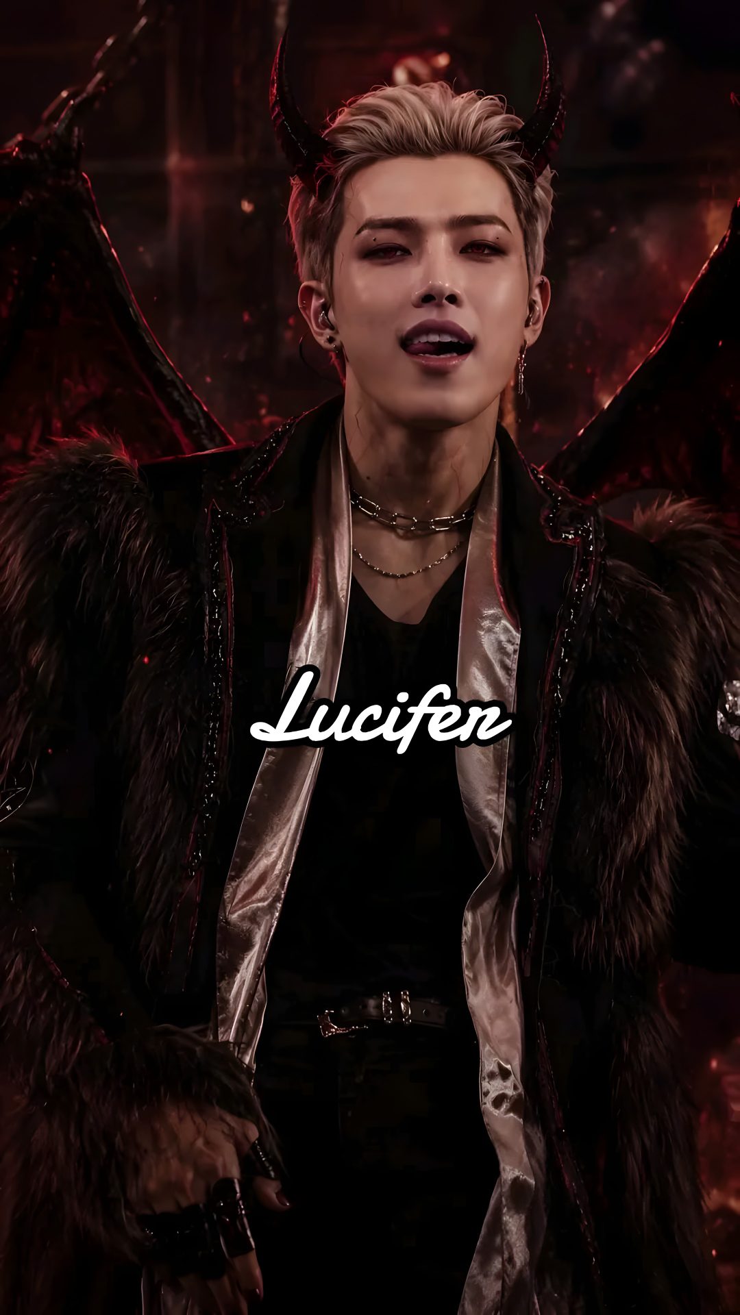 an image of a male with horns on his head and wings over his shoulder, in front of a red background Ateez Halloween black
