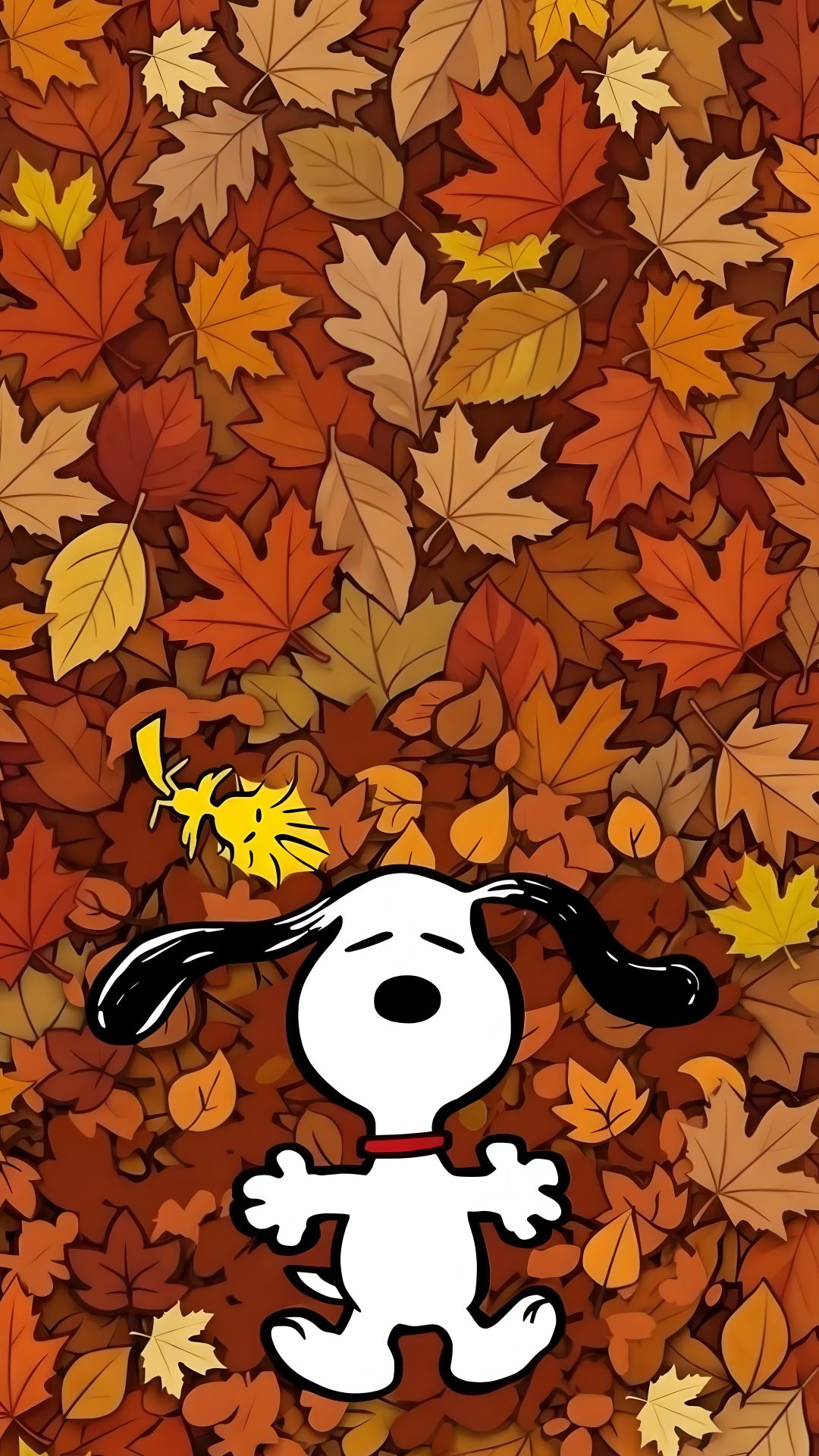 a cartoon dog is surrounded by leaves Peanuts Halloween saddle brown