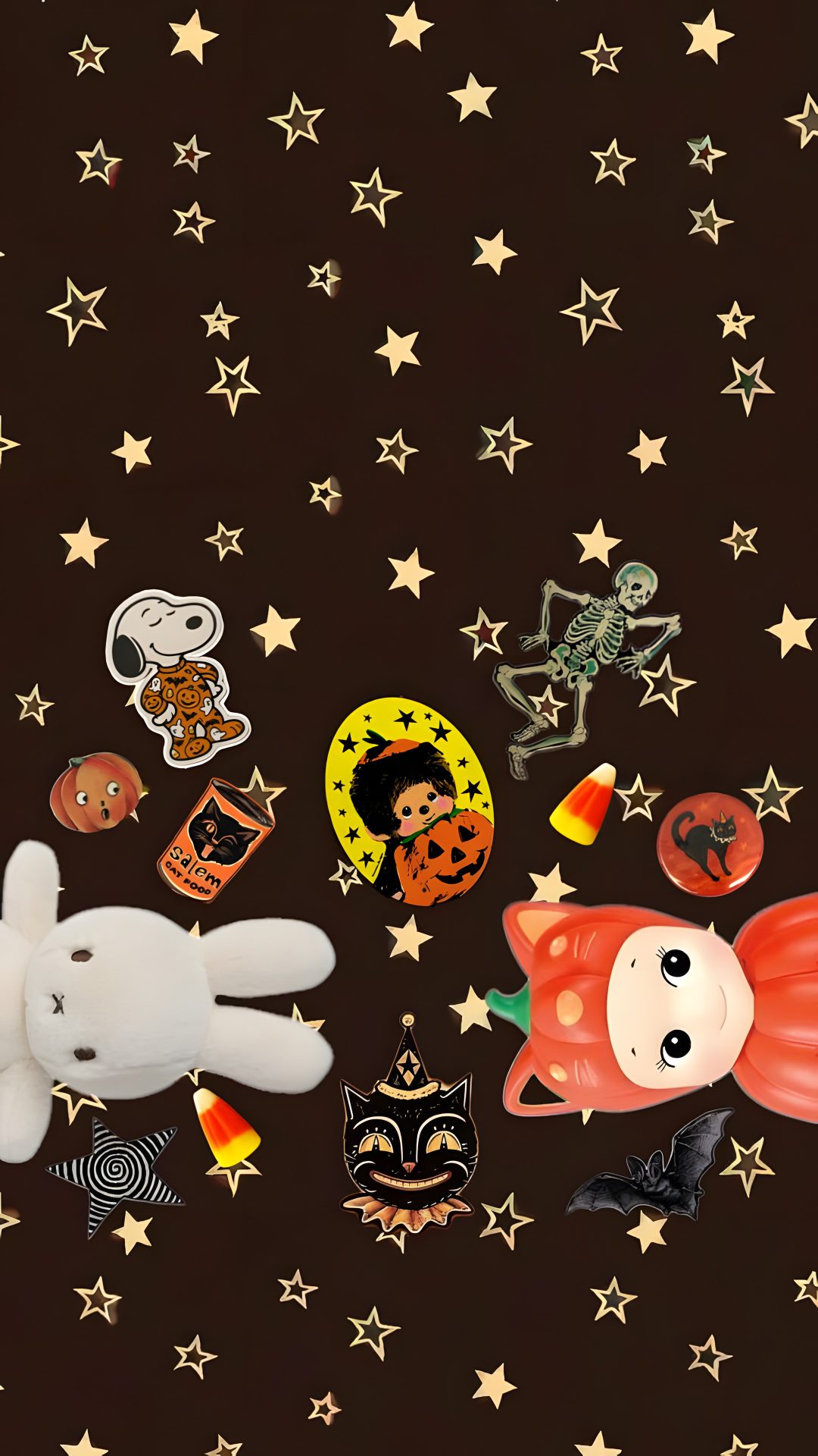several halloween pins and stickers on a black background with stars in the shape of pumpkins Baggu Halloween black
