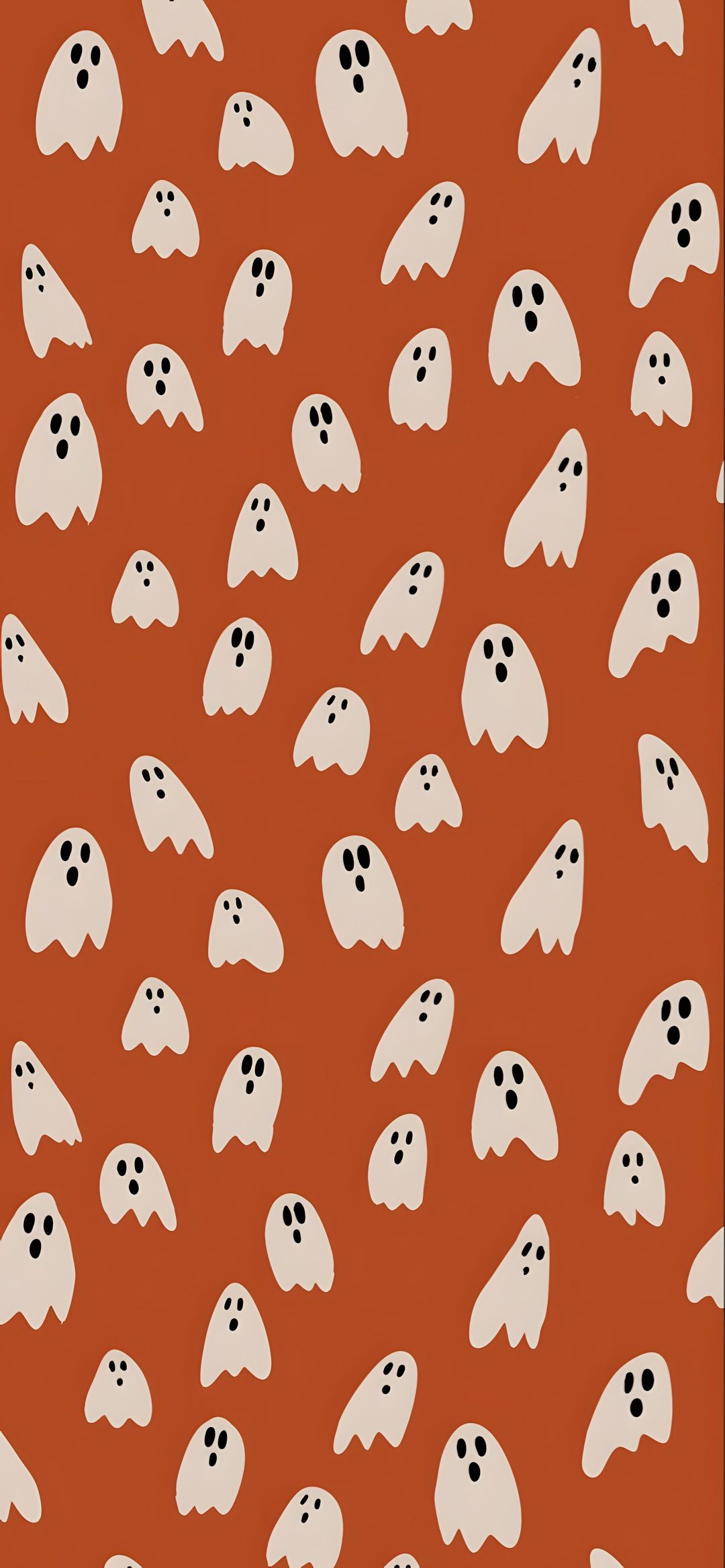 an orange background with white ghost faces on it Ios 16 Aesthetic Halloween sienna