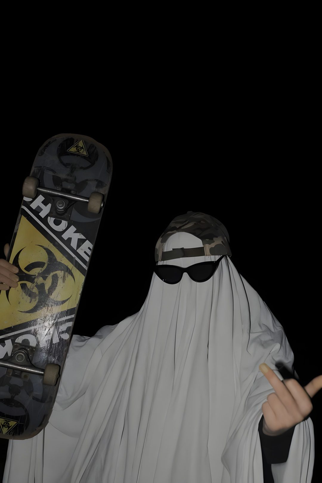 a man dressed as a nun holding a skateboard in one hand and making the peace sign Halloween Middle Finger black