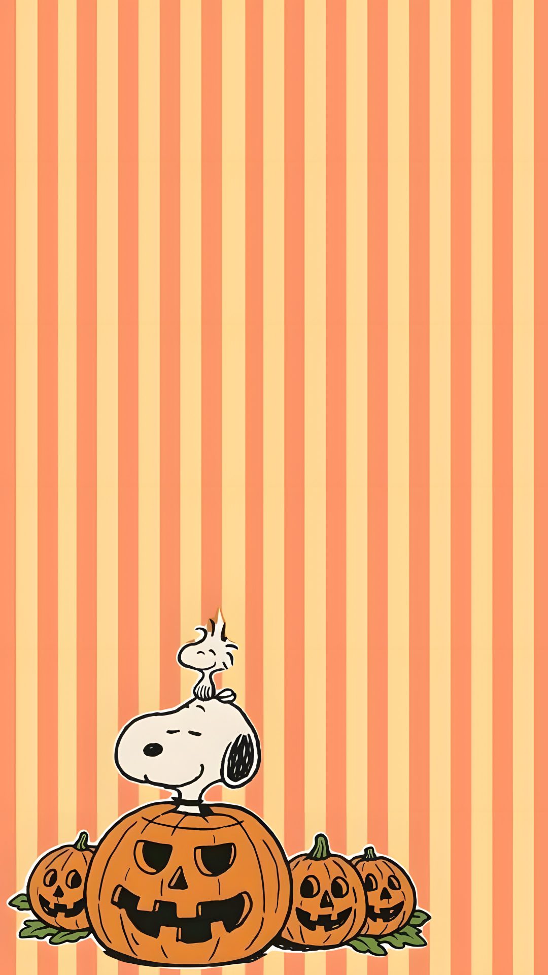 a cartoon dog sitting on top of a pumpkin Charlie Brown Halloween Iphone light salmon