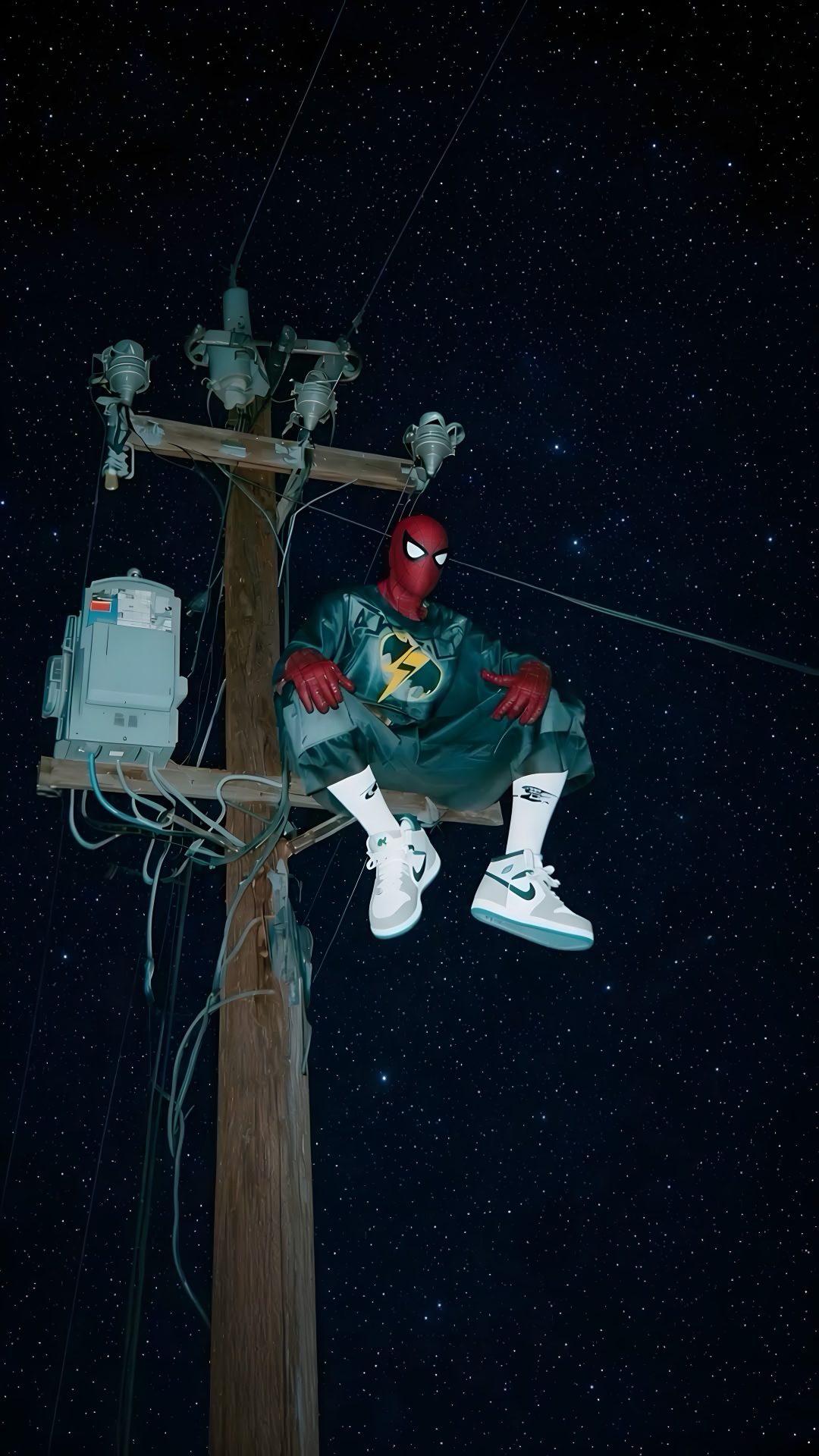 a spider man sitting on top of a telephone pole Halloween Spiderman Spiderman, black