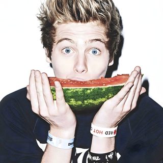 a young man holding a piece of watermelon in front of his face with both hands 5sos Halloween 5sos Photoshoot, 5sos Luke, Luke Roberts, Eating Watermelon, Android, antique white