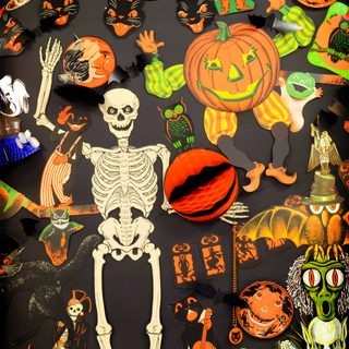 an assortment of halloween stickers on a black surface with pumpkins and skeletons in the background Beistle Halloween 70s Halloween Party Decorations, Retro Halloween Party Decorations, Vintage Halloween Party Decorations, dark olive green