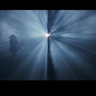 a person standing in the middle of a dark room with light coming from behind them Halloween 2 2009 Halloween 2 2009 Movie, Halloween 2 Rob Zombie, Halloween 3 Rob Zombie, dark slate gray