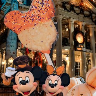 mickey and minnie mouse float in front of a building with pumpkins on it's head Disney World Halloween Magic Kingdom Halloween, Iphone Disneyland Halloween, Walt Disney World Halloween, dark olive green
