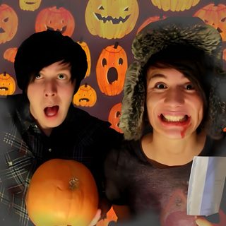 two people are holding pumpkins in front of a wall with halloween decorations on it Dan And Phil Halloween 2009 Frank Iero Halloween, Mikey Way And Gabe Saporta, Dan And Phil Halloween Costume, dark olive green