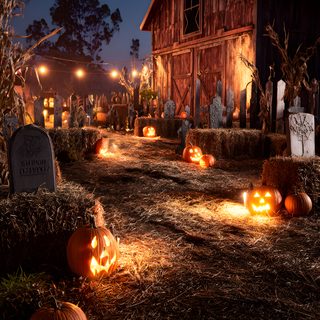 pumpkins lit up in front of a barn at night with lights on the ground Halloween Farm Halloween Outdoor Theme Ideas, Farm Halloween Party, Haunted Farm Halloween Decor, black