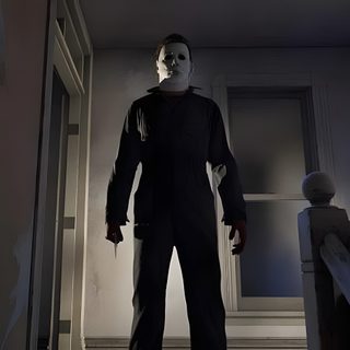 a creepy looking man standing in an empty hallway Halloween The Game Halloween The Game, Michael Myers, Product Launch, Halloween, dark slate gray