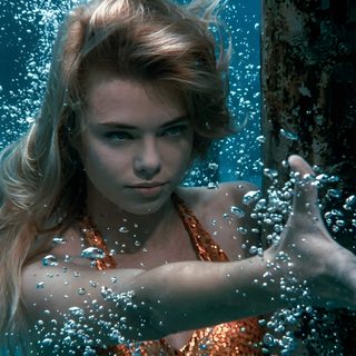 a woman in an orange swimsuit under water with her hands out to the side Halloween H20 H2o Mermaids Aesthetic, Real Mermaid, H2o Aesthetic, H2o, Aquamarine Movie, dark slate gray