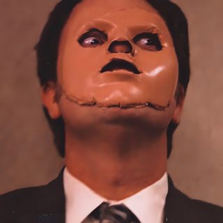 a man in a suit and tie with his face painted like a human head wearing a fake mask Dwight Halloween Dwight Schrute Profile Picture, Dwight Halloween, The Office Dwight, sienna