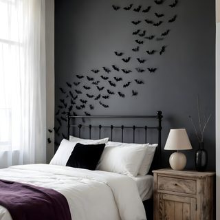 a bed sitting in a bedroom next to a window with bats painted on the wall Halloween Bat For Bedroom dim gray