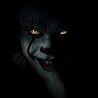 a creepy clown with yellow eyes and dark makeup looks at the camera while standing in the dark Halloween Movie Iphone Horror Hd For Mobile, Rural Photography, Pennywise Dark, black