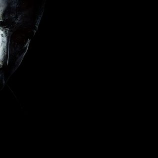 a man with white makeup and black hair wearing a creepy mask, in the dark Halloween Myers Horror Movie Laptop, Terrifier Black Background, Laptop Horror Movie,