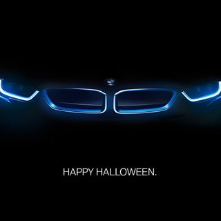 a car with the words happy halloween written on it's front lights in the dark Bmw Halloween Bmw Halloween, Bmw Halloween Background, Bmw Halloween 4k, Bmw Halloween Hd, black