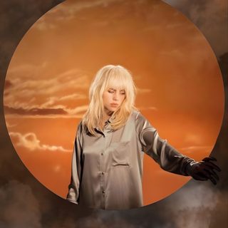 a woman standing in the clouds with her arms out and looking at the sun behind her Halloween Billie Eilish Gold Wing Billie, Billie Eilish Orange, Goldwing Billie, dark olive green