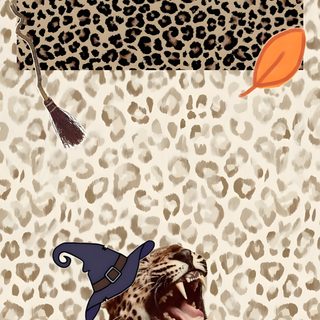 a leopard with a witch hat and pumpkins on it's head sitting in front of a leopard print background Halloween Leopard Print tan