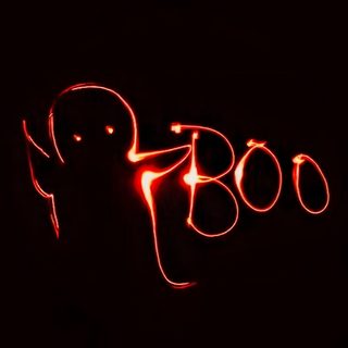 a black background with red lights in the shape of an elephant and two smaller elephants Halloween Boo - Anthracite Ios Halloween, Purple Halloween Boo, Boo Ghost, Red And Black Halloween,