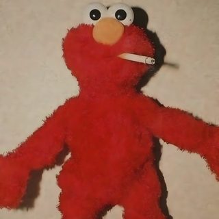 a large red stuffed animal sitting on top of a white floor next to a wall Elmo Halloween Elmo Side Profile, Images That Are Cool, High Elmo, Elmo Pfps, Elmo Photo, Elmo Aesthetic, gray
