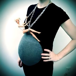an image of a woman holding a baby bump in her belly with the caption, miley cryus wrecking ball Wrecking Ball Halloween Funny Pregnant Costumes, Costume Ideas For Pregnant Women, Pregnant Lady Halloween Costumes, black