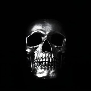 a black and white photo of a skull in the dark Halloween Skull For Desktop High Resolution Skull 4k, Skull Black Background, Black Background Skull Photo,