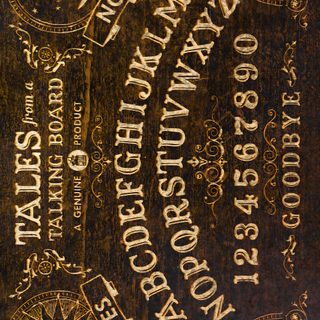 an old book with writing on it and some other things in the back ground, Halloween Ouija Board Yellow Ouija Board Design, Ouija Yellow Custom, Gold Ouija Board Tattoo, dark olive green