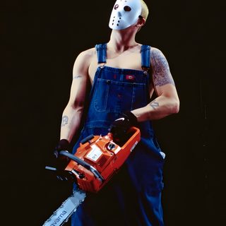 a man in overalls with a chainsaw on his shoulder and wearing a mask Eminem Halloween Eminem Jason Outfit, Eminem The Rapper Costume, Eminem Hockey Mask Outfit, black