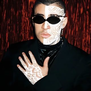 a man with white paint on his face and hands, wearing black clothing and sunglasses Bad Bunny Halloween Bad Bunny Sun Costume, Bad Bunny Costume Ideas, Bad Bunny Cosplay, black