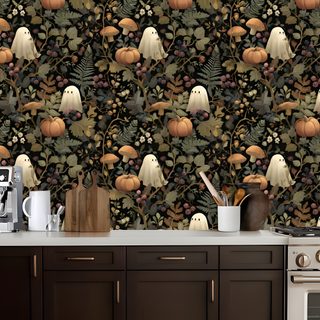 a kitchen area with a stove, microwave and wallpaper featuring pumpkins and ghost heads Halloween Kitchen dark slate gray