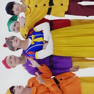 there are many people standing in a row wearing colorful outfits and holding their hands up Bts Halloween Bts Cute Pictures Together, Bts Favorite Colors, Bts Costume, Bt21 Costume, rosy brown