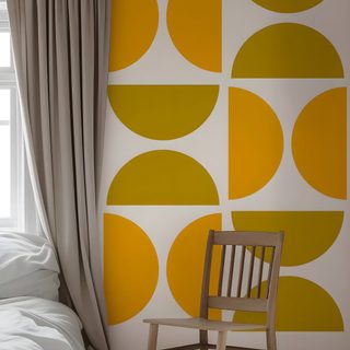 a chair sitting in front of a window next to a wall with circles on it Halloween Circle Geometric In Ochre Mid Century Modern, Modern, Retro Mid Century, Old, gray