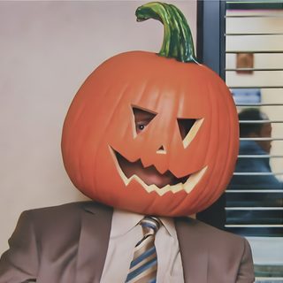 a man in a suit and tie with a pumpkin on his head Dwight Halloween Dwight Pumpkin Head, Best Of The Office, The Office Show, Office Icon, indian red