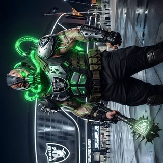 a man standing in the middle of a city at night Raiders Halloween dark slate gray