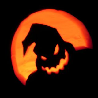 the silhouette of a dog in front of a full moon with its head turned to look like it's face Halloween Booo Pumpkin Oogie Boogie, Pumpkin Carving Ideas Oogie Boogie, Oggie Boogie Man Pumpkin, black