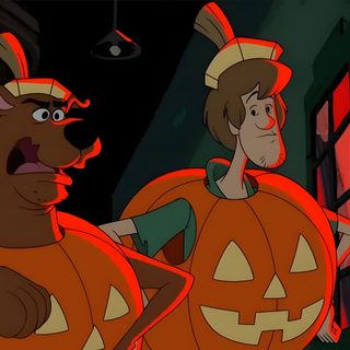 an animated image of two people dressed up as jack and pumpkins, one in the foreground Scooby Doo Halloween 1920x1080 black