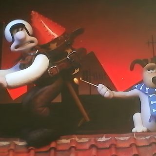 two animated dogs standing on top of a roof next to each other in front of a red light Wallace And Gromit Halloween Hd Wallace And Gromit Car, Wallace And Gromit Dog, Wallace And Gromit London, dark olive green