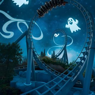 an amusement park ride at night with ghost decorations on the track and stars in the sky Halloween Roller Coaster Ghost Roller Coaster, Halloween Roller Coasters, Ghost-rollercoster Custom, midnight blue