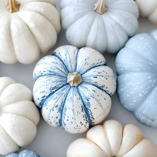 blue and white painted pumpkins on a table Pastel Blue Halloween Fall Pumpkin Iphone, Blue Fall Aesthetic, Blue Fall Theme, Blue Pumpkin Decor, silver