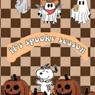 a group of pumpkins sitting on top of a checkered floor Pinterest Snoopy Halloween sienna