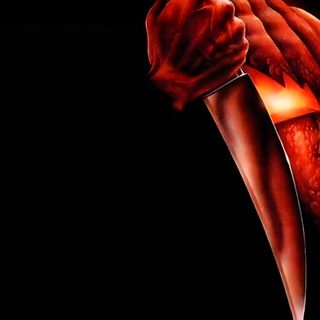 a hand holding a lit up pumpkin with glowing eyes and hands in the shape of an angel Bing Halloween Pumpkin From Halloween Movie, Halloween Movie Jack O Lantern, Horror Movie Jack O Lantern, black
