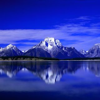 the mountain range is reflected in the still waters of the lake, with blue skies and white clouds Dual Monitor Halloween Howling Wolf For Pc, Mountain 16:9, Sound Waves For Pc, midnight blue