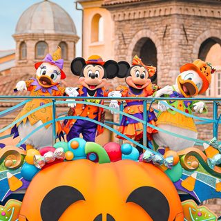 mickey mouse and friends on top of a pumpkin float in disney world's halloween parade Disney World Halloween Disneyland Halloween, Disney Halloween Lockscreen, Disney World Halloween, dark khaki