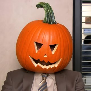 a man wearing a suit and tie with a pumpkin on his head Dwight Halloween The Office Halloween Episodes, Best Of The Office, The Office Show, Office Jokes, indian red