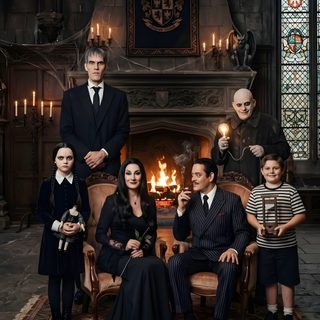 a group of people sitting in front of a fire place Halloween Addams Family Adams Family Art, Thing Addams, Adams Family, Addams Family, Family Art, black