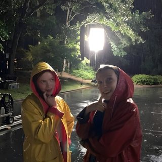 two women in raincoats standing on the side of a road at night, one holding an umbrella Matching Stranger Things And Halloween Characters Max Shoes, Strangerthings, Elmax, Max, dark slate gray