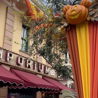 an orange and yellow awning on the side of a building next to a mailbox Disneyland Halloween Aesthetic Vacation Planner, Disneyland Fall Decorations, Disney Merch, sienna