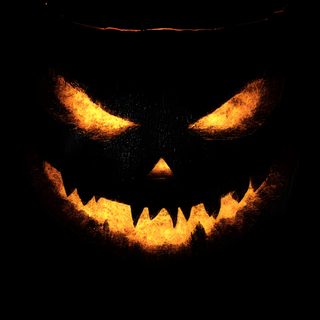a scary pumpkin with glowing eyes in the dark Halloween Black Backgrounds Halloween Scary, Scary Halloween Backgrounds, Halloween Realistic,