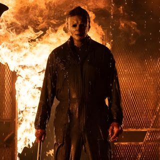 a man standing in front of a fire Halloween Kills 4k Film, Halloween, Donald Pleasence, Book Background, The Boogeyman, saddle brown